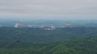 AX57_005 - 5K aerial stock footage of Satsop Nuclear Power Plant cooling towers in Satsop, Washington
