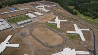 AX57_035 - 5K aerial stock footage fly over the Washington Corrections Center, Shelton, Washington