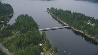 AX58_022 - 5K aerial stock footage of Treasure Island Road bridge connecting Grapeview, Washington to Reach Island