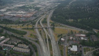 AX58_076 - 5K stock footage aerial video of I-405 / I-5 interchange with light traffic in Tukwila, Washington