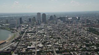 AX59_005 - 5K aerial stock footage fly over the French Quarter to approach Downtown New Orleans, Louisiana