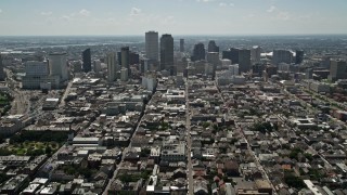 AX59_006 - 5K aerial stock footage follow Bourbon Street through French Quarter to approach Downtown New Orleans, Louisiana