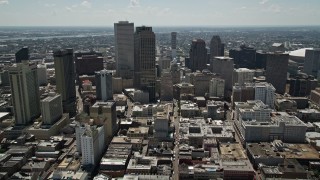 AX59_007E - 5K aerial stock footage follow Bourbon Street into Downtown New Orleans, Louisiana