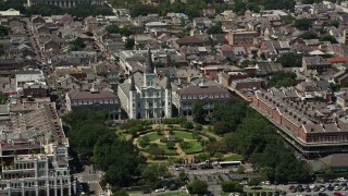 AX59_015 - 5K aerial stock footage of St. Louis Cathedral and Jackson Square, New Orleans, Louisiana