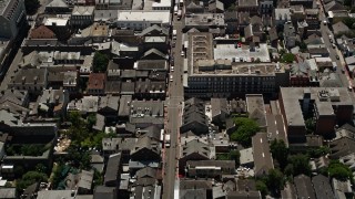 AX59_035E - 5K aerial stock footage tilt to a bird's eye view of Bourbon Street in the French Quarter, New Orleans, Louisiana