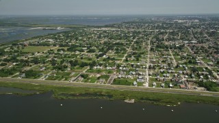 AX59_050 - 5K aerial stock footage of Lower Ninth Ward neighborhoods in New Orleans, Louisiana