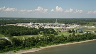 AX60_017 - 5K aerial stock footage of flying away from the Dupont Chemical Plant in LaPlace, Louisiana
