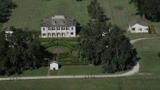 AX60_026 - 5K aerial stock footage orbit the Evergreen Plantation and gardens in Edgard, Louisiana