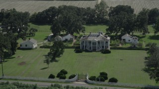 AX60_028 - 5K aerial stock footage orbit the main house and grounds of Evergreen Plantation, Edgard, Louisiana