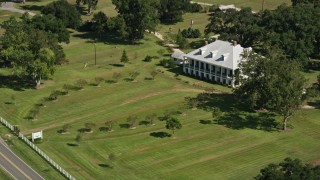 AX60_046 - 5K aerial stock footage of an orbit around St. Joseph Plantation house and grounds in Vacherie, Louisiana