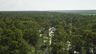 AX60_082 - 5K aerial stock footage fly over and pan across a vast swamp in St. John the Baptist Parish, Louisiana