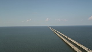 AX60_094 - 5K aerial stock footage of the Lake Pontchartrain Causeway with light traffic in Louisiana