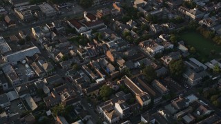 AX61_015 - 5K aerial stock footage fly over the historic French Quarter in New Orleans at sunset, Louisiana