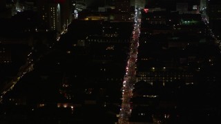 AX62_041 - 5K aerial stock footage flyby French Quarter to reveal Bourbon Street at night, New Orleans, Louisiana