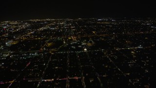 AX62_045 - 5K aerial stock footage of flying by the famous French Quarter at night, New Orleans, Louisiana