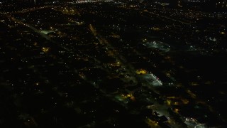 AX63_045 - 5K aerial stock footage fly over streets and neighborhoods in Upper Ninth Ward at night, New Orleans, Louisiana 