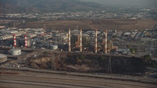 AX64_0050 - 5K stock footage aerial video of LADWP Valley Generating Station and smoke stacks, Sun Valley, California