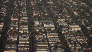 AX64_0065 - 5K aerial stock footage of apartment buildings and suburban homes in Glendale, California