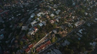 AX64_0074E - 5K aerial stock footage of homes on hills in Silver Lake, California