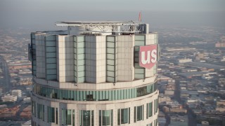 AX64_0103 - 5K aerial stock footage of orbiting top of the US Bank Tower, Downtown Los Angeles, California
