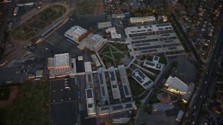 AX64_0136 - 5K aerial stock footage of Francis Polytechnic Senior High school in Sun Valley, California sunset