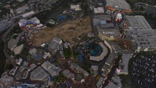AX64_0161 - 5K aerial stock footage tilt to bird's eye of Universal City theme park, California, twilight