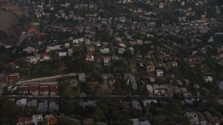 AX64_0178 - 5K aerial stock footage fly over hilltop homes in Silver Lake, California, twilight