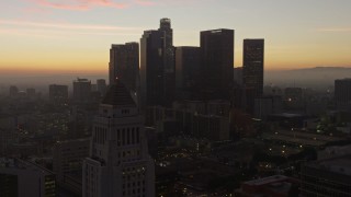 AX64_0191E - 5K aerial stock footage flyby Downtown Los Angeles and City Hall, California, twilight
