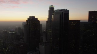 AX64_0194 - 5K aerial stock footage of Downtown Los Angeles' tall skyscrapers at twilight, California