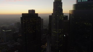 AX64_0195 - 5K aerial stock footage of flying past Downtown Los Angeles skyscrapers, California, twilight