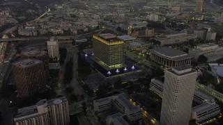 AX64_0210 - 5K aerial stock footage of LADWP office building and concert halls, Downtown Los Angeles, California, twilight