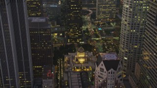 AX64_0215 - 5K aerial stock footage of Los Angeles Public Library in Downtown Los Angeles, California, twilight