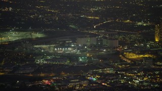 AX64_0255 - 5K aerial stock footage of helicopter flying toward Twin Towers Correctional Facility prison, Downtown Los Angeles, California, Night