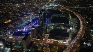 AX64_0375 - 5K aerial stock footage flyby JW Marriott, The Ritz-Carlton Hotel and Staples Center in Downtown Los Angeles, California, night