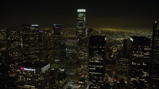 AX64_0382 - 5K aerial stock footage of an approach to US Bank Tower in Downtown Los Angeles, California, night