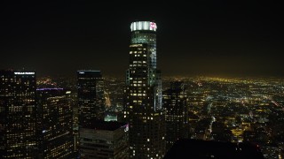 AX64_0383 - 5K aerial stock footage approach the top of US Bank Tower, Downtown Los Angeles, California, night