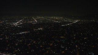 AX64_0417E - 5K aerial stock footage of city streets and neighborhoods, Echo Park, Los Angeles, California, night