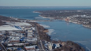 AX66_0028 - 4.8K aerial stock footage of Hempstead Harbor and snow covered neighborhoods, Glenwood Landing, New York