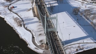 AX66_0055 - 4.8K aerial stock footage orbit the Robert F Kennedy Bridge in winter, New York