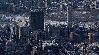 AX66_0056 - 4.8K aerial stock footage of Mount Sinai hospital buildings with snow, Upper East Side. New York City