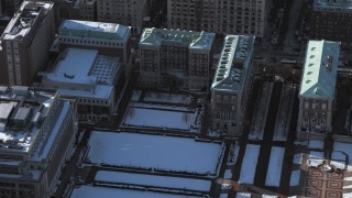 AX66_0070 - 4.8K aerial stock footage of Columbia University Graduate School of Journalism with snow, New York City