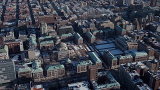 AX66_0074E - 4.8K aerial stock footage orbit around the Columbia University campus during winter, Morningside Heights, New York City