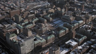 AX66_0075 - 4.8K aerial stock footage of a view of the Columbia University campus with snow, Morningside Heights, New York City