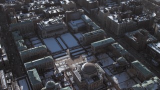 AX66_0077 - 4.8K aerial stock footage of Columbia University campus buildings with snow, New York City