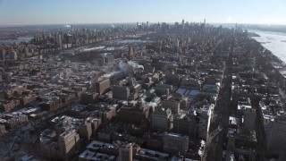 AX66_0084 - 4.8K aerial stock footage of Columbia University with Central Park and Midtown in the background, New York City