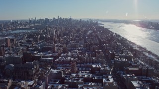 AX66_0085E - 4.8K aerial stock footage tilt from Columbia University to reveal Midtown Manhattan, New York City