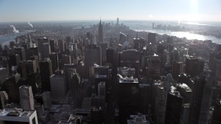 AX66_0109 - 4.8K stock footage aerial video fly over Midtown Manhattan toward the Empire State Building, New York City