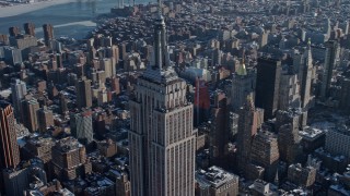 AX66_0113 - 4.8K stock footage aerial video of orbiting the famous Empire State Building, New York City