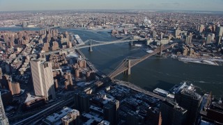 AX66_0140 - 4.8K aerial stock footage of Brooklyn Bridge and Manhattan Bridge, New York City