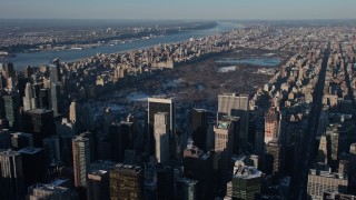 AX66_0185E - 4.8K aerial stock footage fly over Midtown Manhattan toward Central Park, New York City